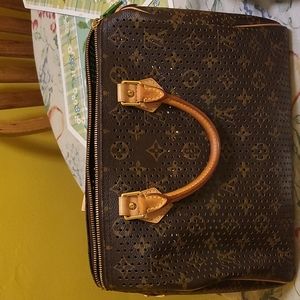 LOUIS VUITTON Monogram Perforated green color inside. PRICE FIRM!!!!